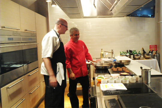 SPE Certified's Executive Chef Anthony Moraes and Rouge Tomate's Executive Pastry Chef James DiStefano share a joke at Eataly