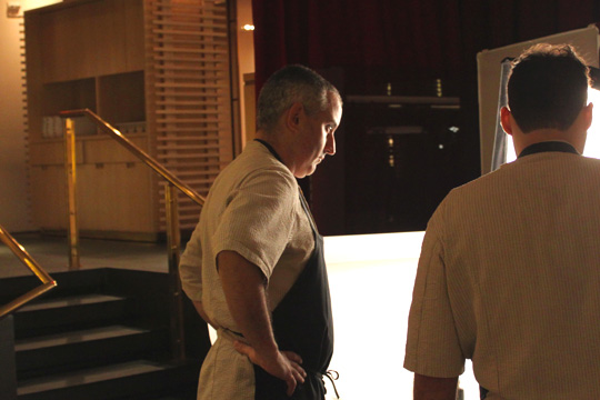 Rouge Tomate's Executive Chef Jeremy Bearman gives direction over the plating of his dishes